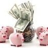 Cute, pink piggy banks standing arround a jar full of money